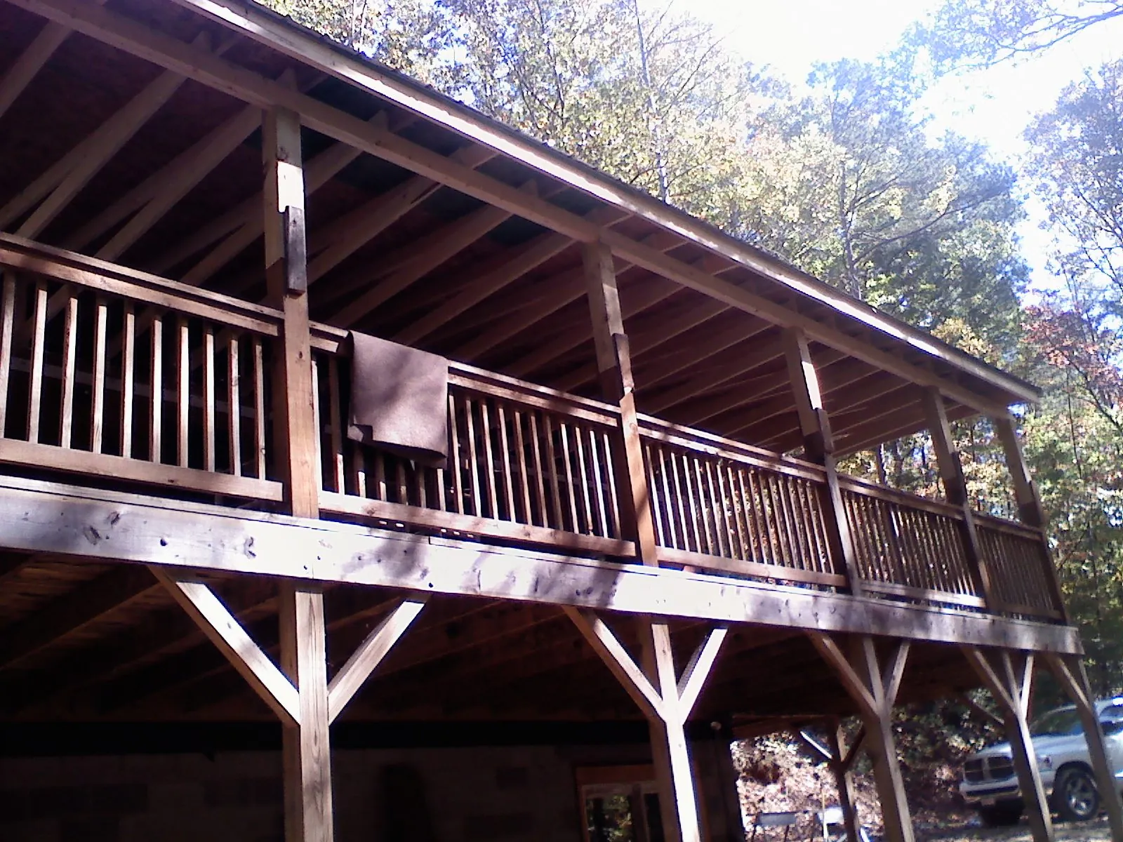 Timber framing under a new elevated porch and deck — Roof Leak Repair in Byers by Roofing Brothers